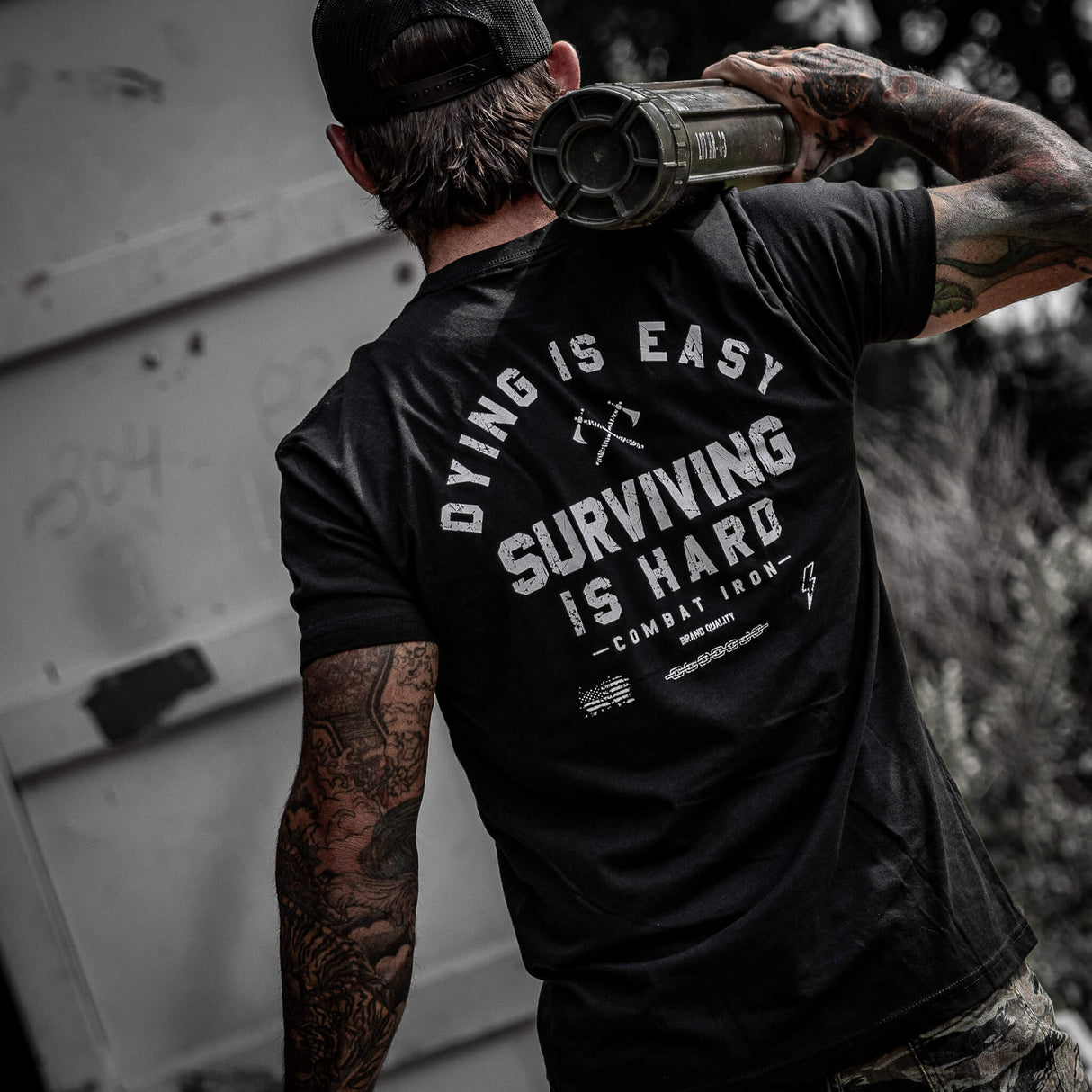 Dying is Easy. Surviving Is Hard Men's T-Shirt From Combat Iron Apparel