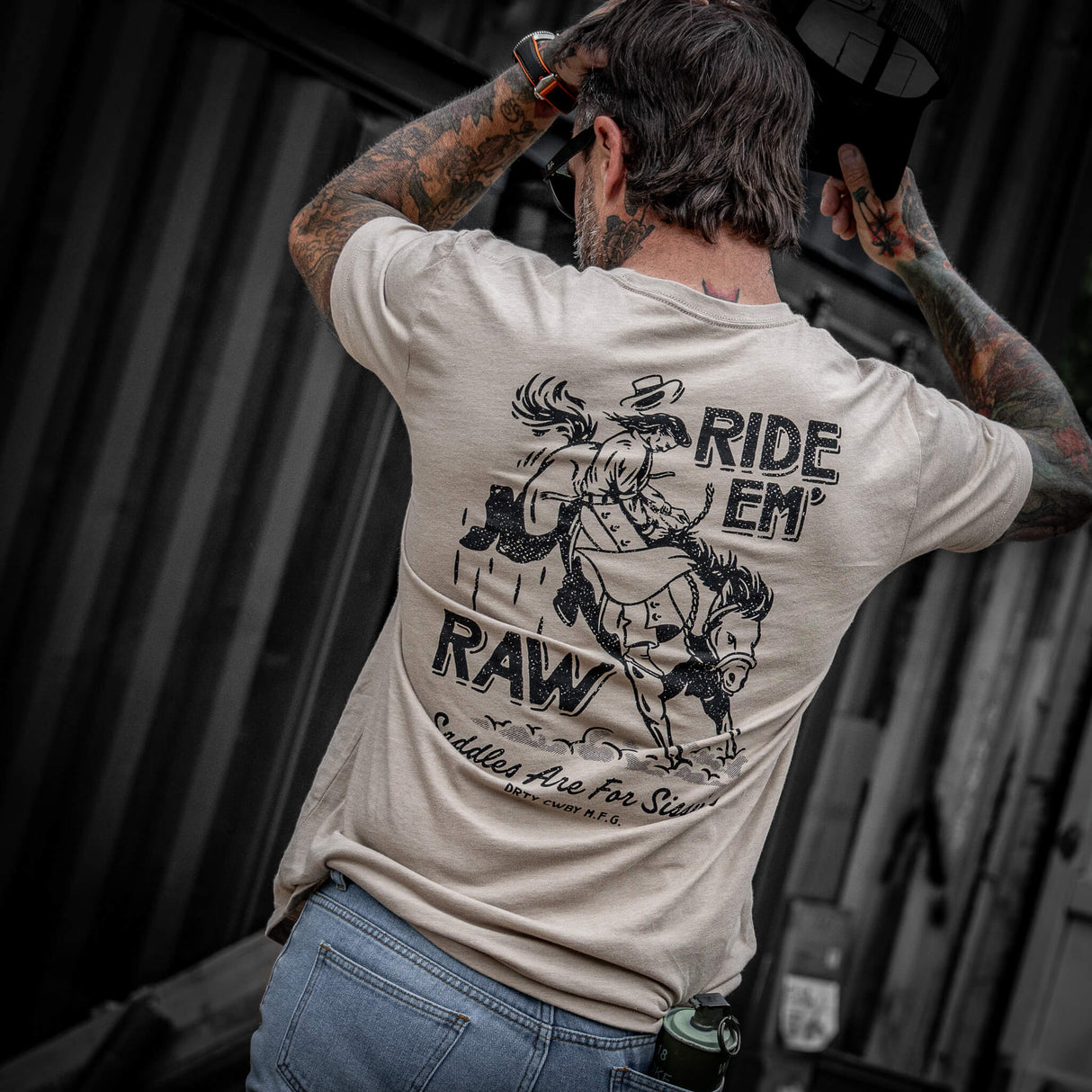 Ride 'Em Raw - Saddles Are For Sissy's Men's T-Shirt from Combat Iron Apparel