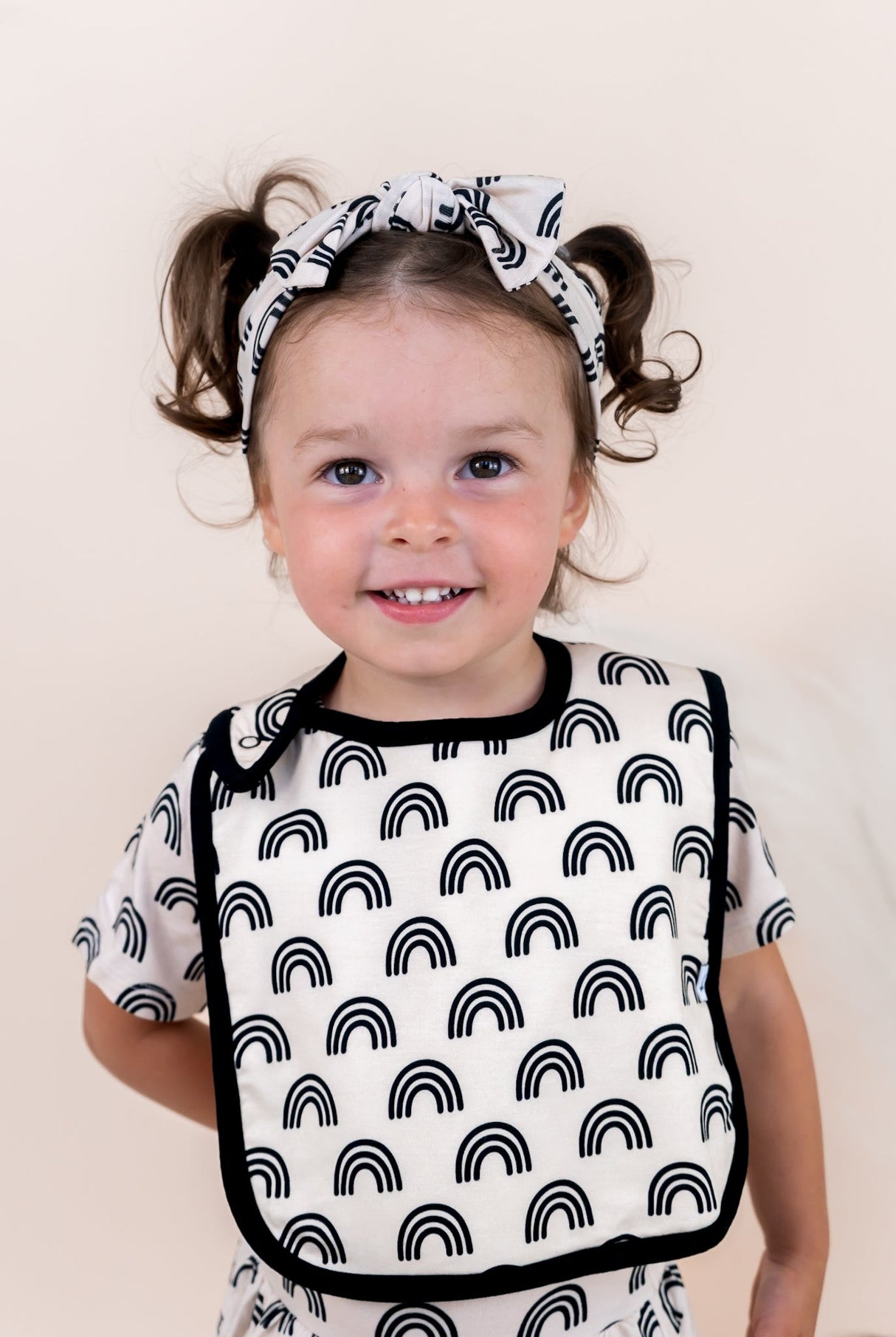 SIMPLE RAINBOW DREAM BABY BIB from DREAM BIG LITTLE CO