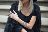 Dharmachakra Noble Truth Sterling Silver & Blue Topaz Bracelet from Cynthia Gale New York