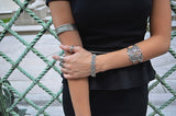 Dharmachakra Noble Truth Sterling Silver & Blue Topaz Bracelet from Cynthia Gale New York