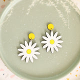 Daisy Stud Dangle Earrings from LE CHIC MIAMI