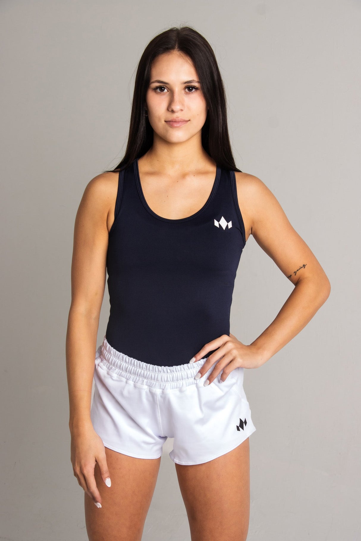 Team Essential Racerback Tank From Diadem Sports