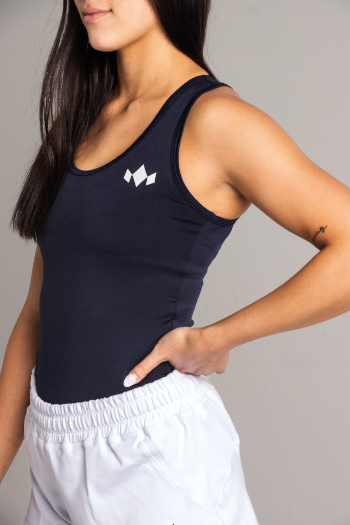 Team Essential Racerback Tank From Diadem Sports