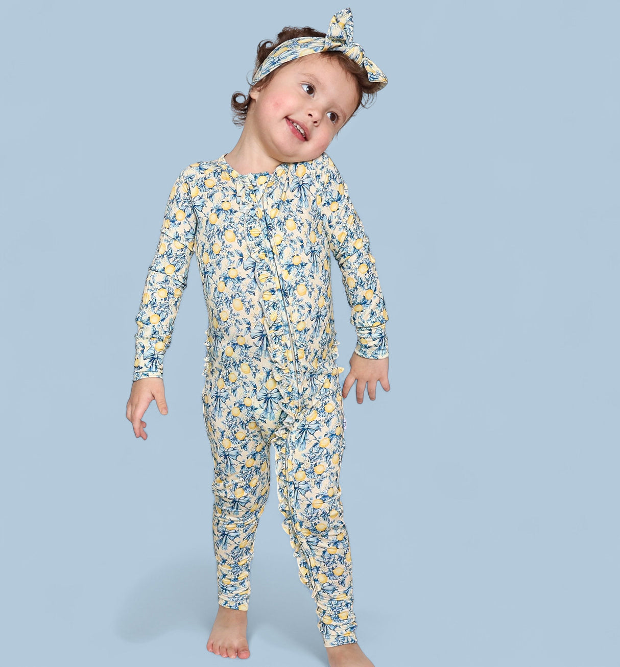 VINTAGE CITRUS TOILE DREAM RUFFLE ROMPER from DREAM BIG LITTLE CO