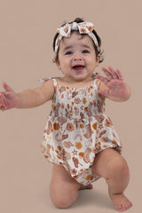 FLOWERS AND BOOTS DREAM BUBBLE ROMPER from DREAM BIG LITTLE CO