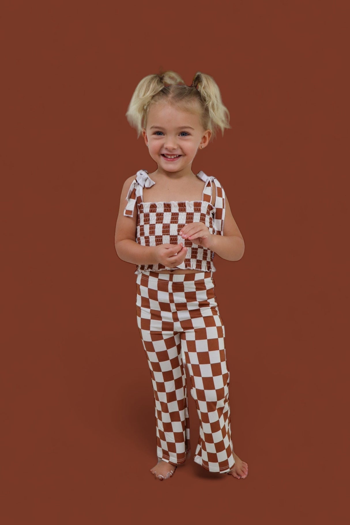 COPPER CHECKERS DREAM SMOCKED FLARE SET from DREAM BIG LITTLE CO