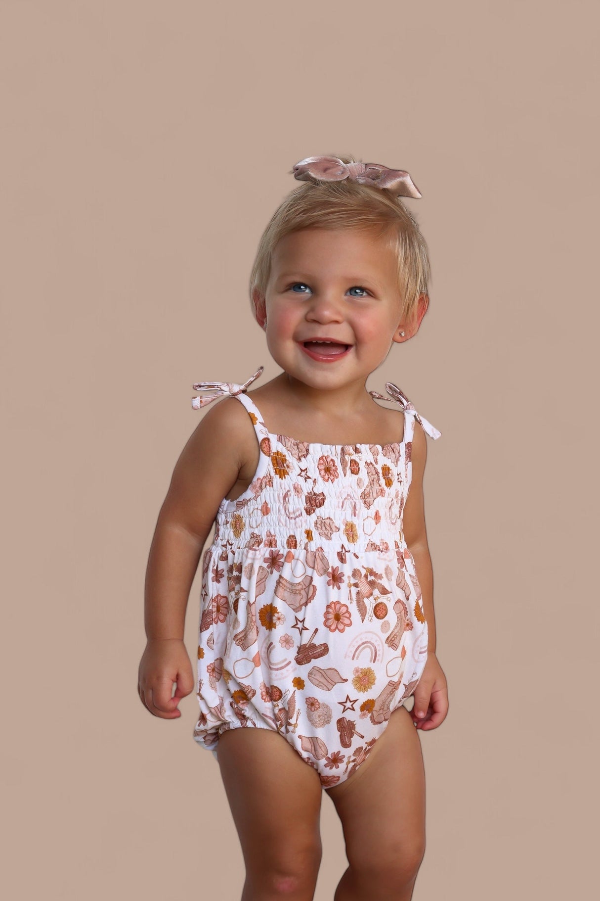 FLOWERS AND BOOTS DREAM BUBBLE ROMPER from DREAM BIG LITTLE CO