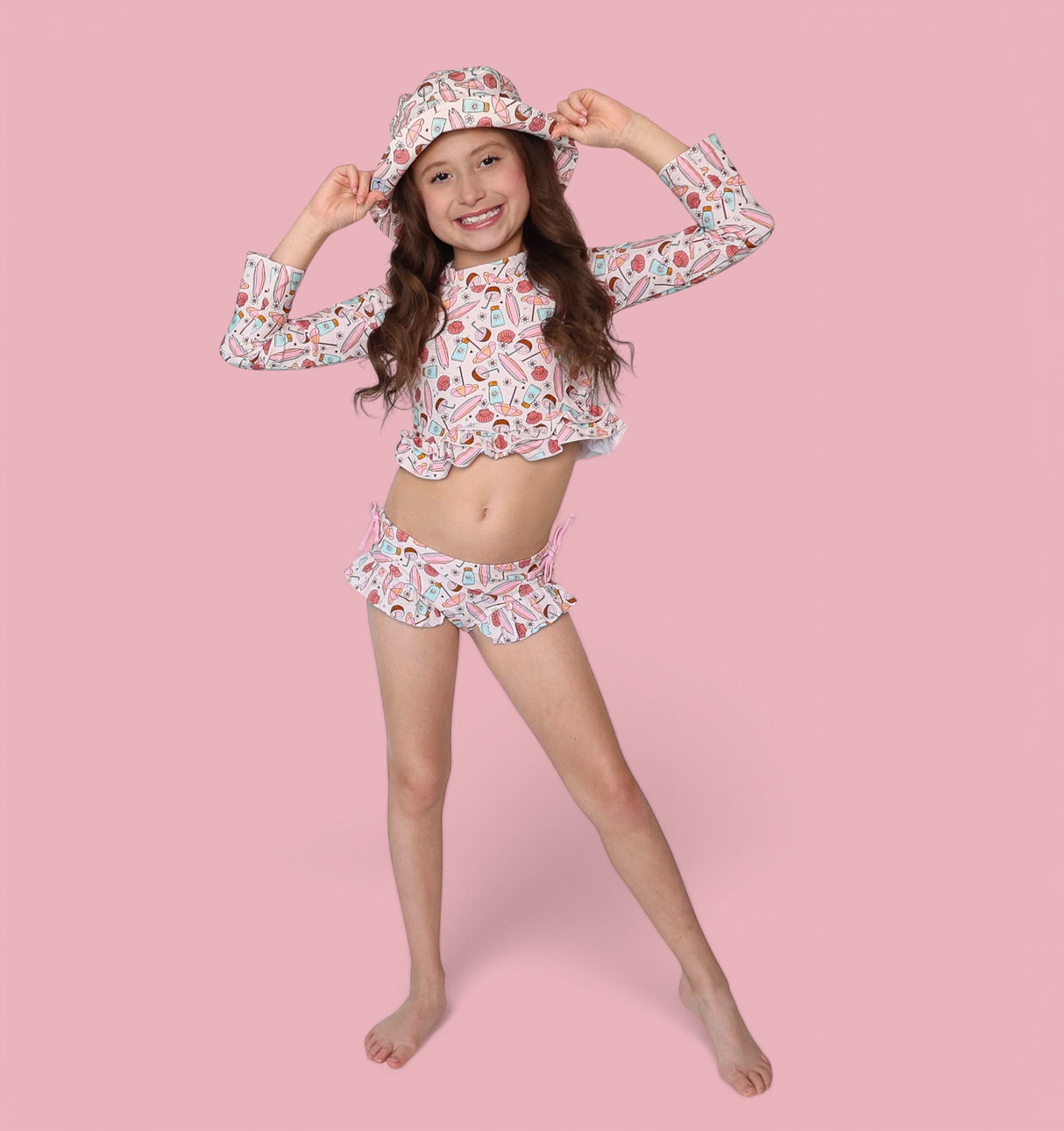 FUN IN THE SUN DREAM TWO-PIECE RASH GUARD RUFFLE SWIM SUIT from DREAM BIG LITTLE CO