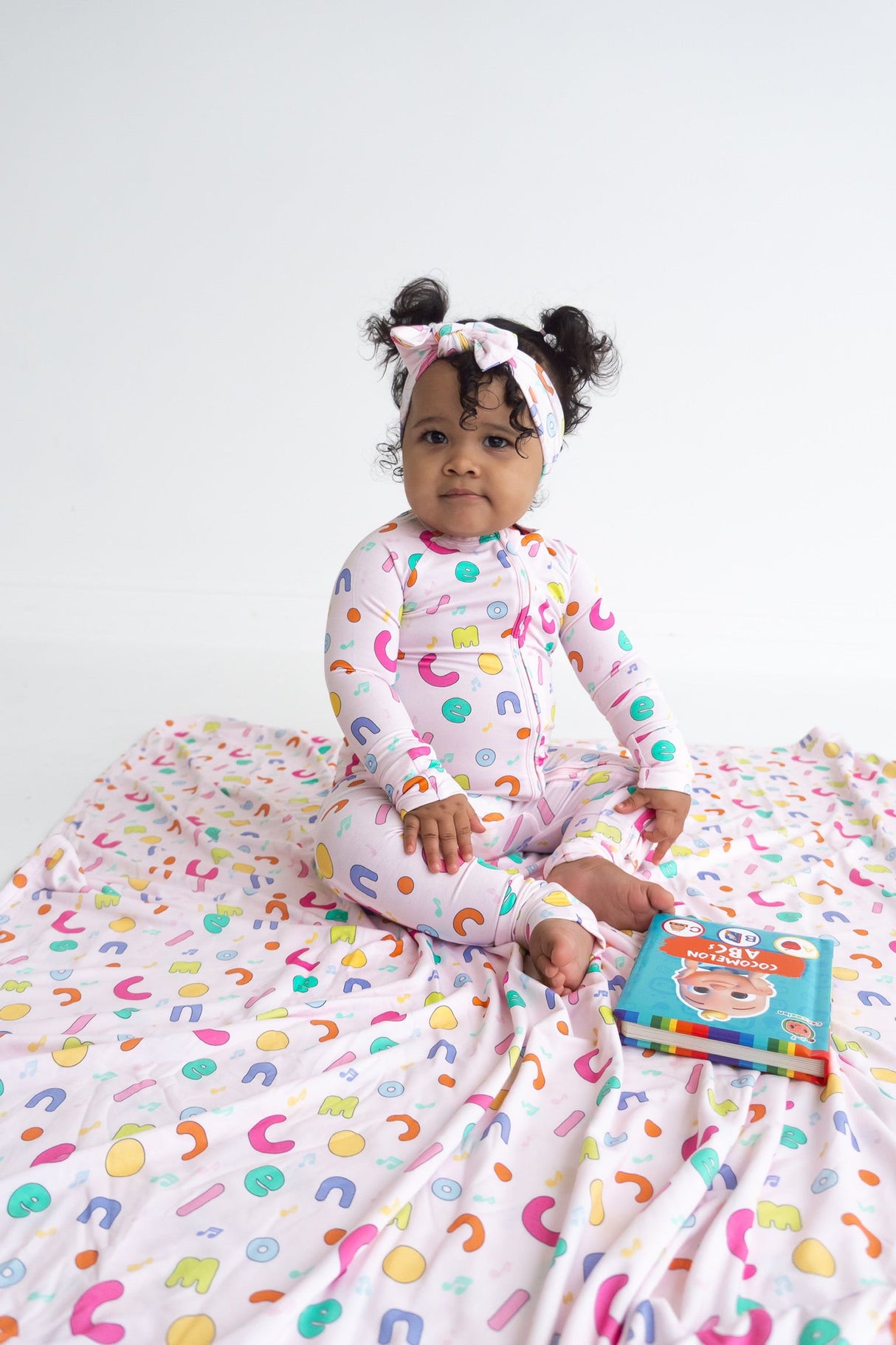 Dream Big Little Co x CoComelon ALPHABET DREAM ROMPER from DREAM BIG LITTLE CO