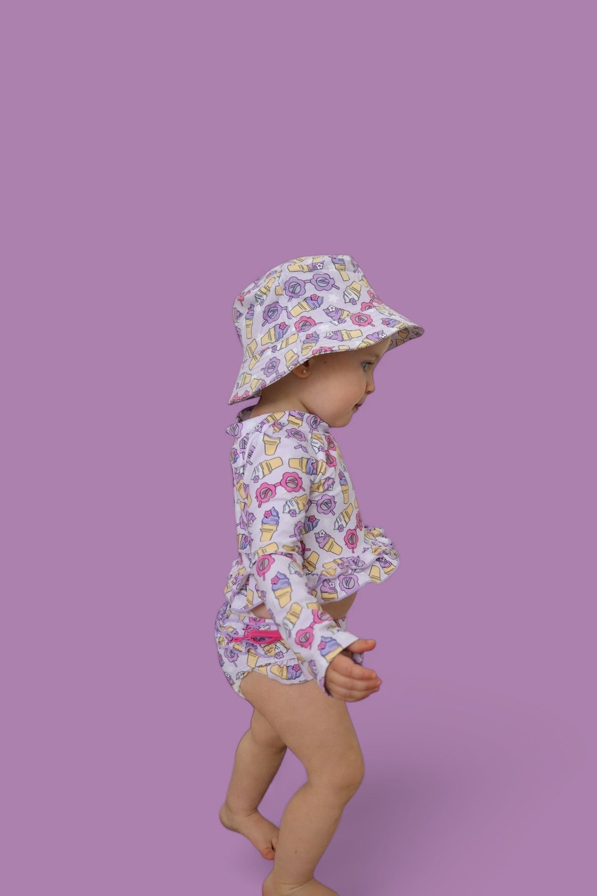 SWEET SUMMER DREAM RASH GUARD RUFFLE TWO-PIECE SWIM SUIT from DREAM BIG LITTLE CO