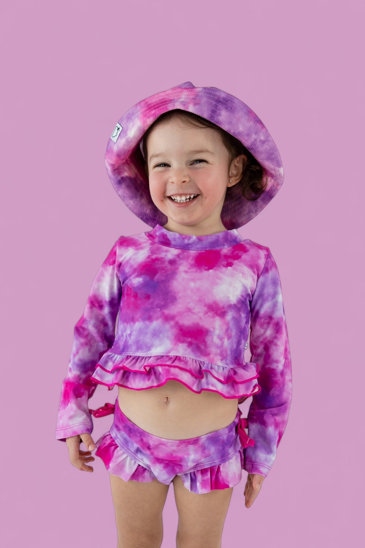 CANDY CLOUDS DREAM 2-PIECE RASH GUARD RUFFLE SWIM SUIT from DREAM BIG LITTLE CO