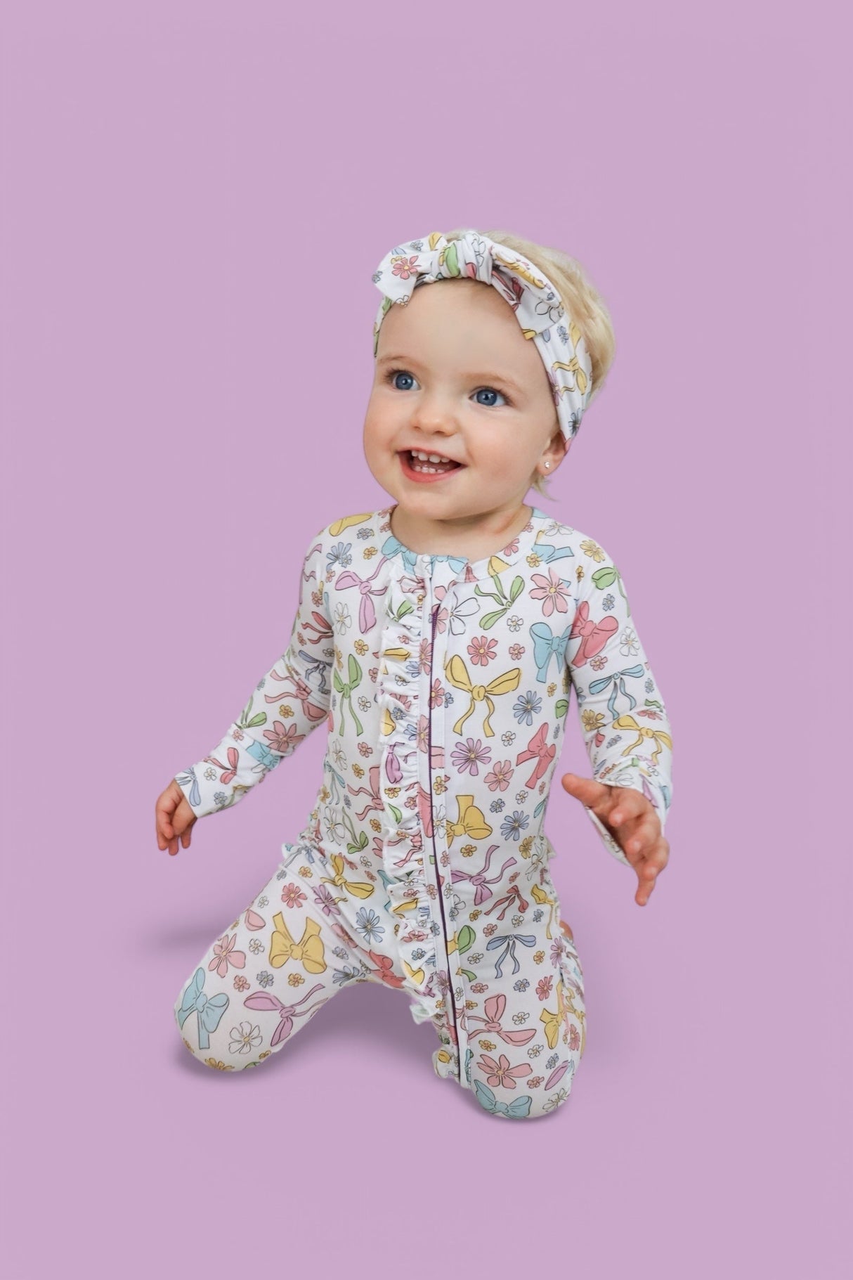 BOW GARDEN DREAM RUFFLE ROMPER from DREAM BIG LITTLE CO