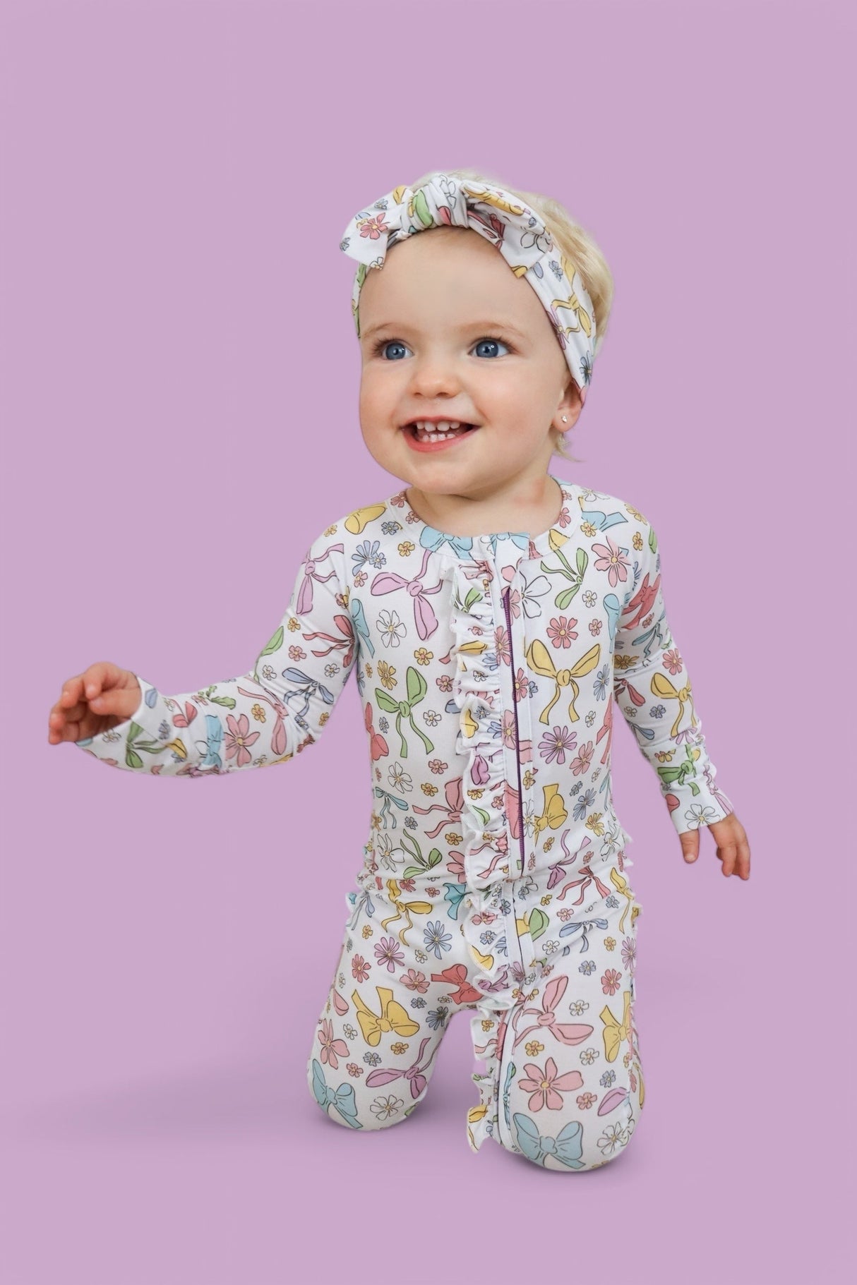 BOW GARDEN DREAM RUFFLE ROMPER from DREAM BIG LITTLE CO