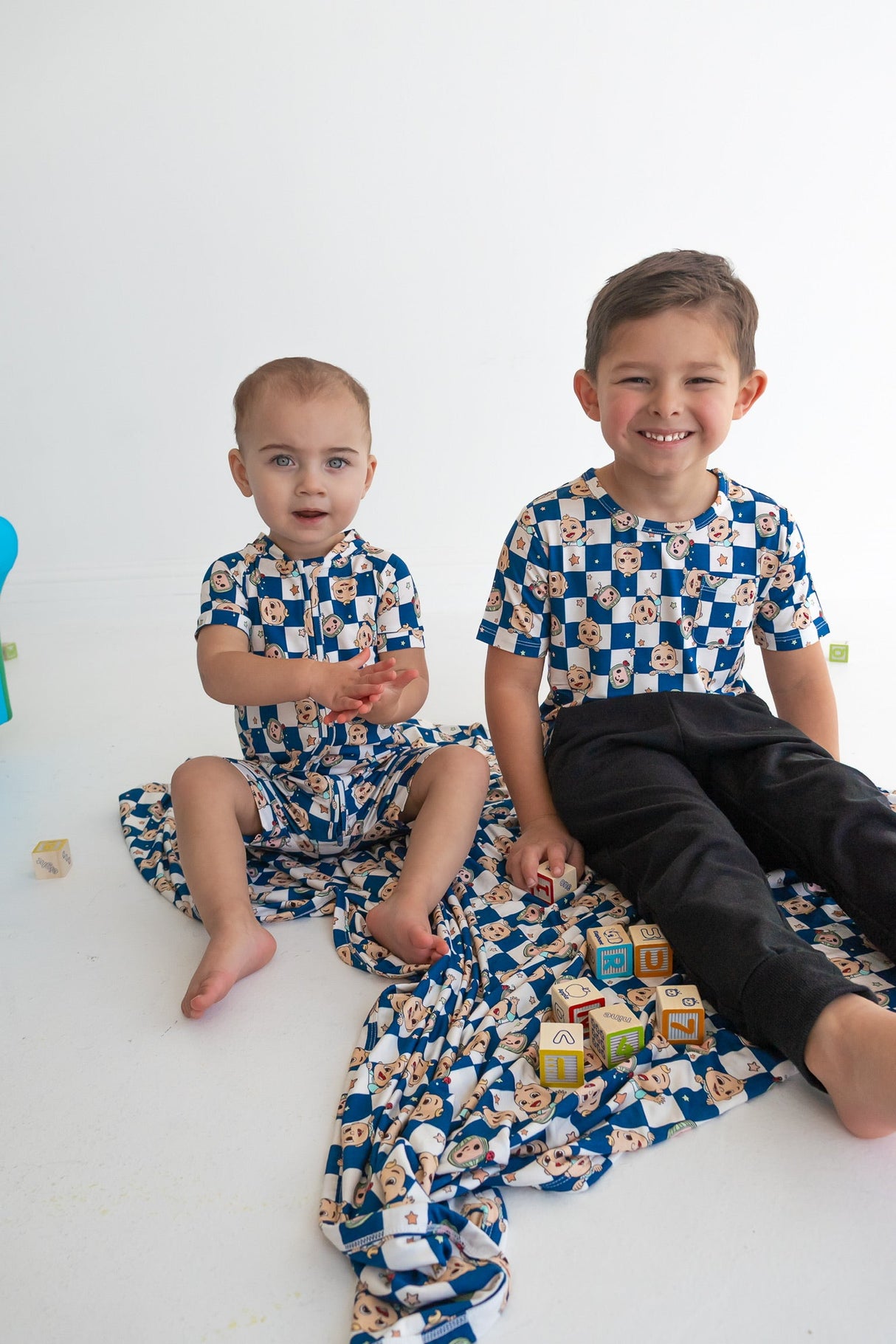 Dream Big Little Co x CoComelon JJ STARRY NIGHT CHECKERS DREAM POCKET TEE from DREAM BIG LITTLE CO