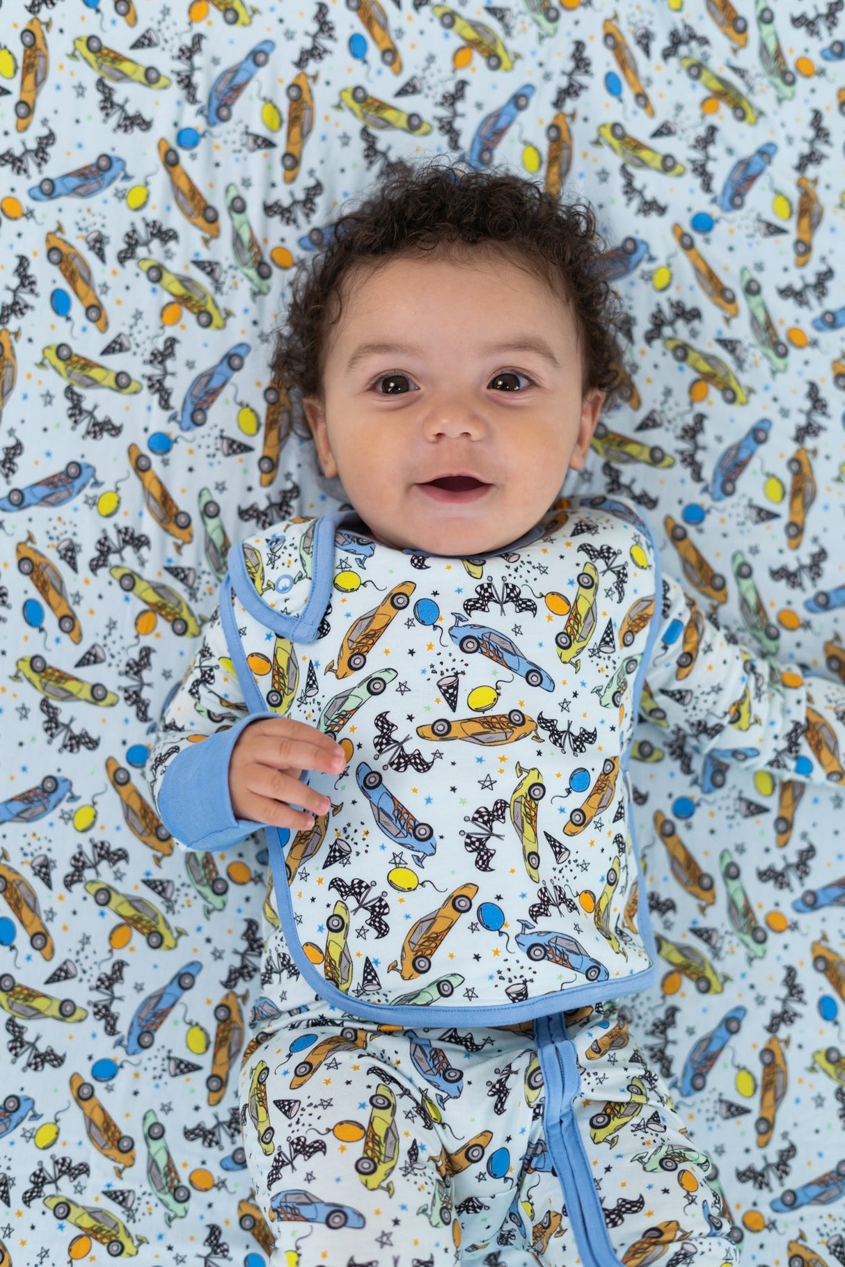 RACING TO MY BIRTHDAY DREAM BABY BIB from DREAM BIG LITTLE CO