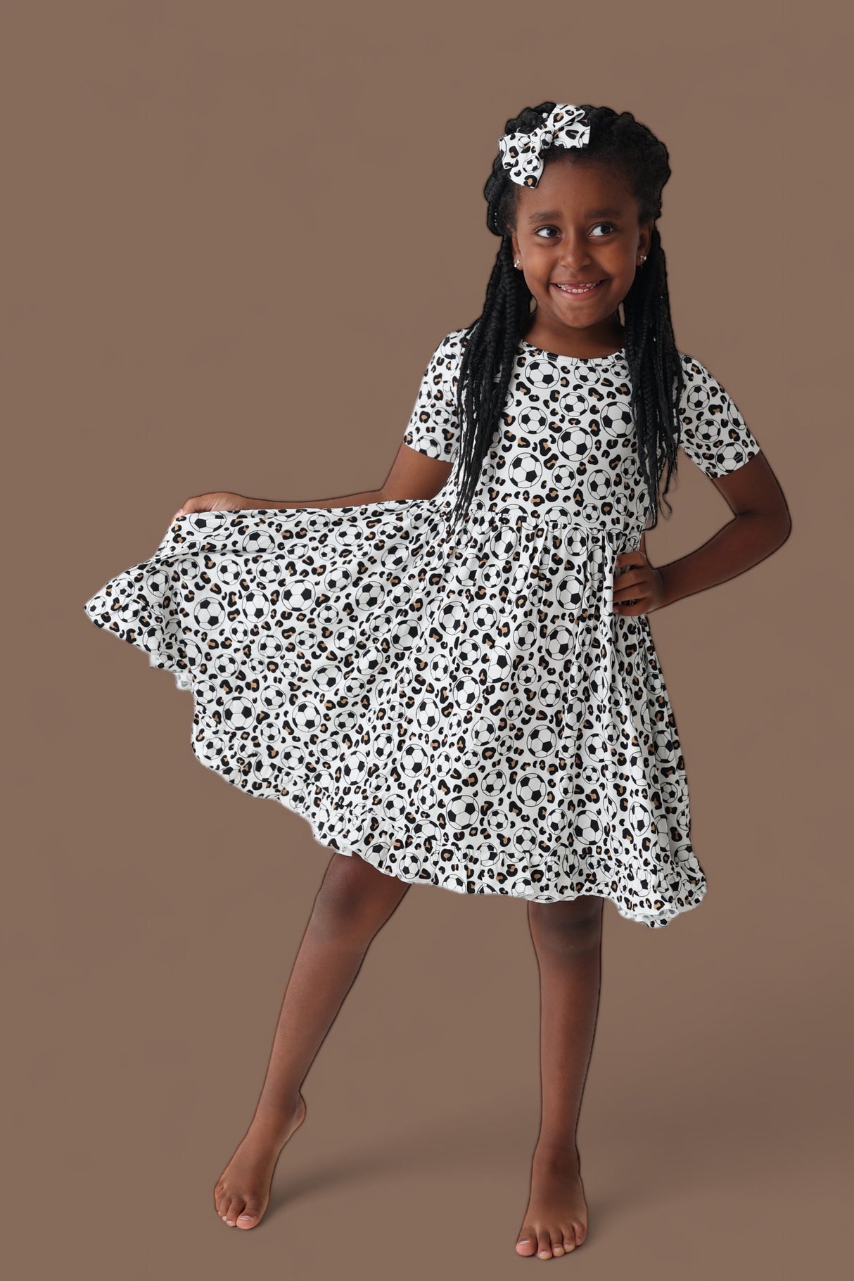 WILD GOALS DREAM RUFFLE DRESS from DREAM BIG LITTLE CO