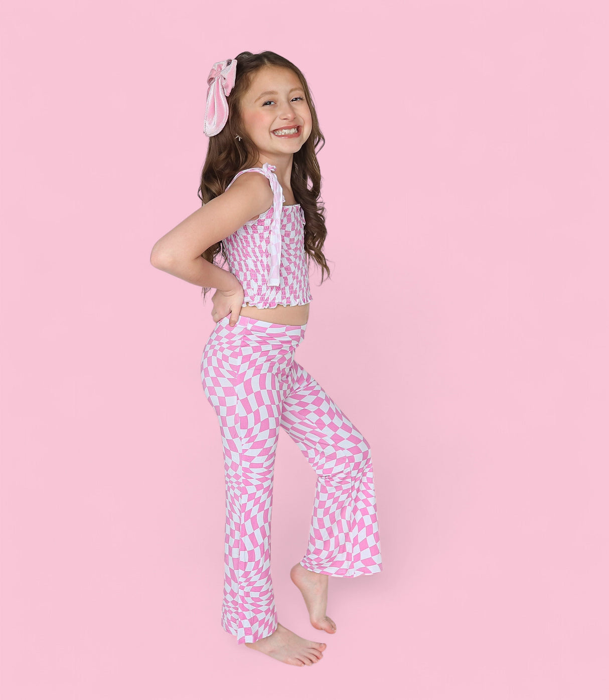 BUBBLEGUM WAVY CHECKERS DREAM SMOCKED FLARE SET from DREAM BIG LITTLE CO