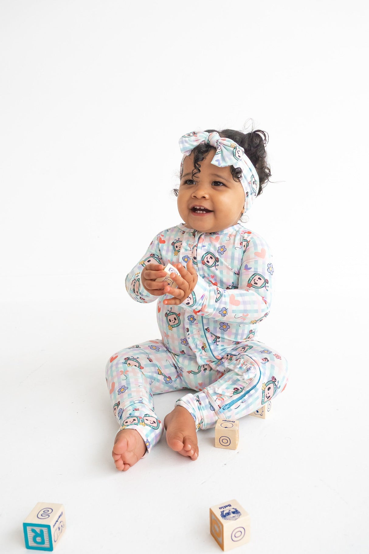 Dream Big Little Co x CoComelon SPRINGTIME MELON DREAM RUFFLE ROMPER from DREAM BIG LITTLE CO
