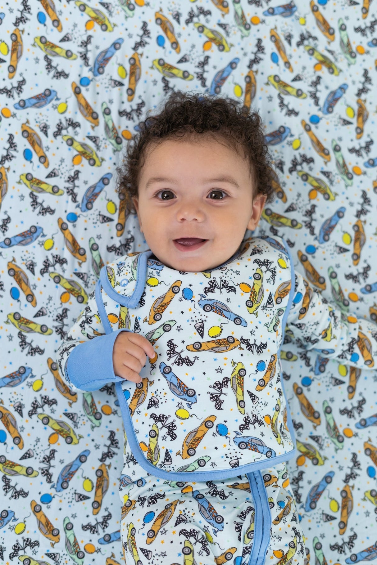 RACING TO MY BIRTHDAY DREAM BABY BIB from DREAM BIG LITTLE CO