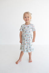 Dream Big Little Co x CoComelon SPRINGTIME MELON SHORT SLEEVE DREAM RUFFLE DRESS from DREAM BIG LITTLE CO