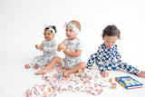 Dream Big Little Co x CoComelon SPRINGTIME MELON DREAM RUFFLE ROMPER from DREAM BIG LITTLE CO