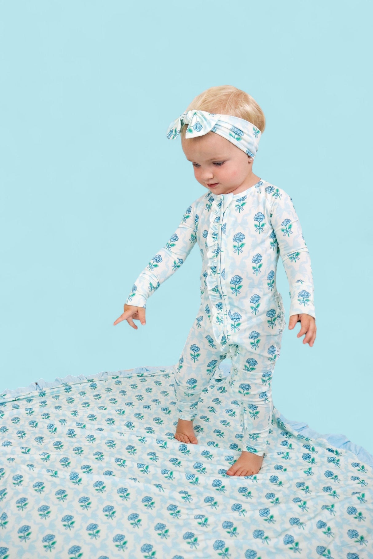 BLUE RIBBON BLOOMS DREAM RUFFLE ROMPER from DREAM BIG LITTLE CO