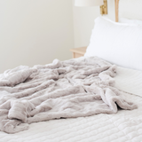 PATTERNED FAUX FUR THROW BLANKETS From Saranoni