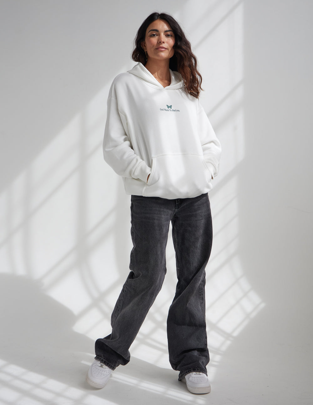 God Heals Unisex Hoodie from Elevated Faith