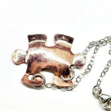 Handmade Hammered Copper Puzzle Piece Necklace from Alexa Martha Designs
