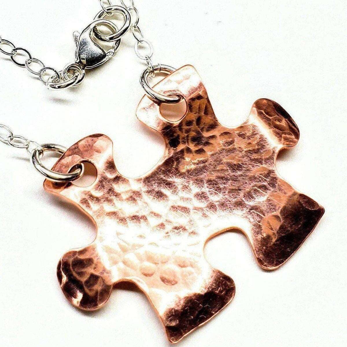 Handmade Hammered Copper Puzzle Piece Necklace from Alexa Martha Designs