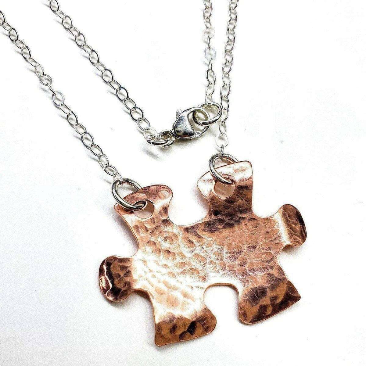 Handmade Hammered Copper Puzzle Piece Necklace from Alexa Martha Designs