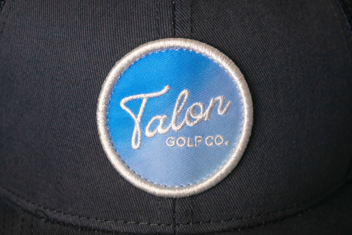 Fade to Blue Trucker Hat from Talon Golf LLC