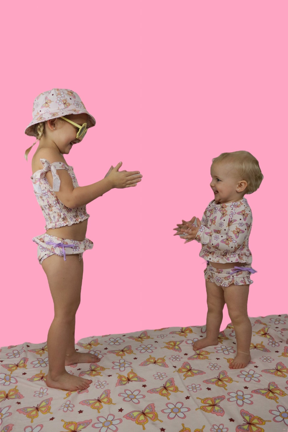 BLOSSOMIN’ BUTTERFLY DREAM 2-PIECE RASH GUARD RUFFLE SWIM SUIT from DREAM BIG LITTLE CO