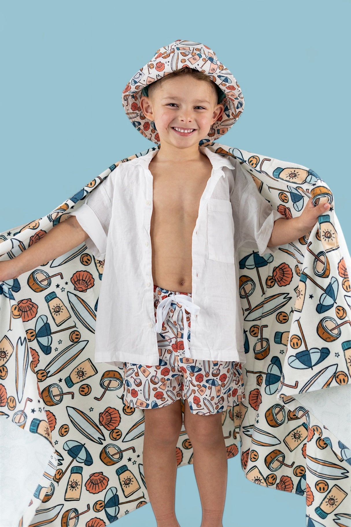 CHASE THE SUN BOY'S DREAM SWIM TRUNKS from DREAM BIG LITTLE CO