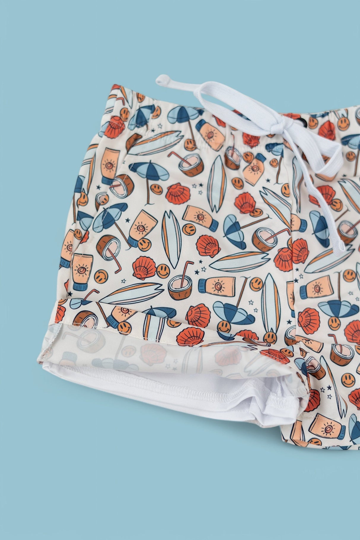 CHASE THE SUN BOY'S DREAM SWIM TRUNKS from DREAM BIG LITTLE CO