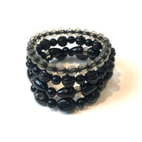 Black & Encased Stack & Stretch Bracelets Set from Leetie Lovendale