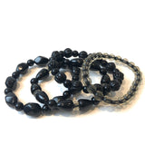 Black & Encased Stack & Stretch Bracelets Set from Leetie Lovendale