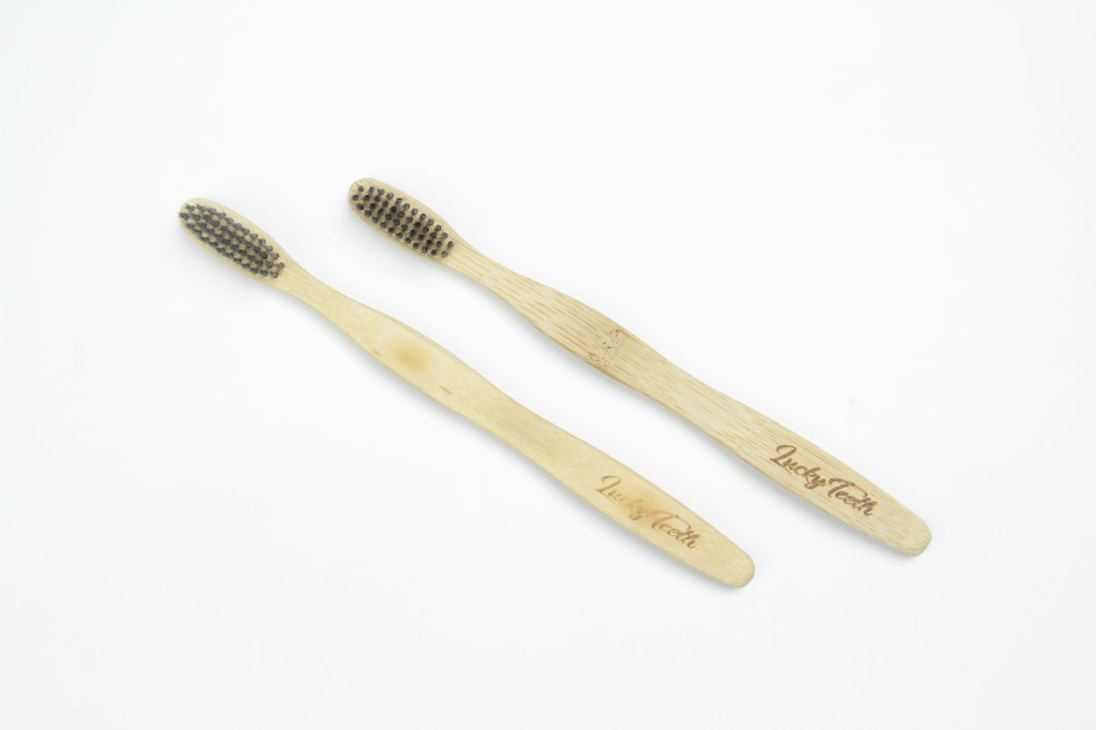 Bamboo Toothbrush With Charcoal Bristles - Soft Bristles, BPA and Phthalates Free from Lucky Teeth