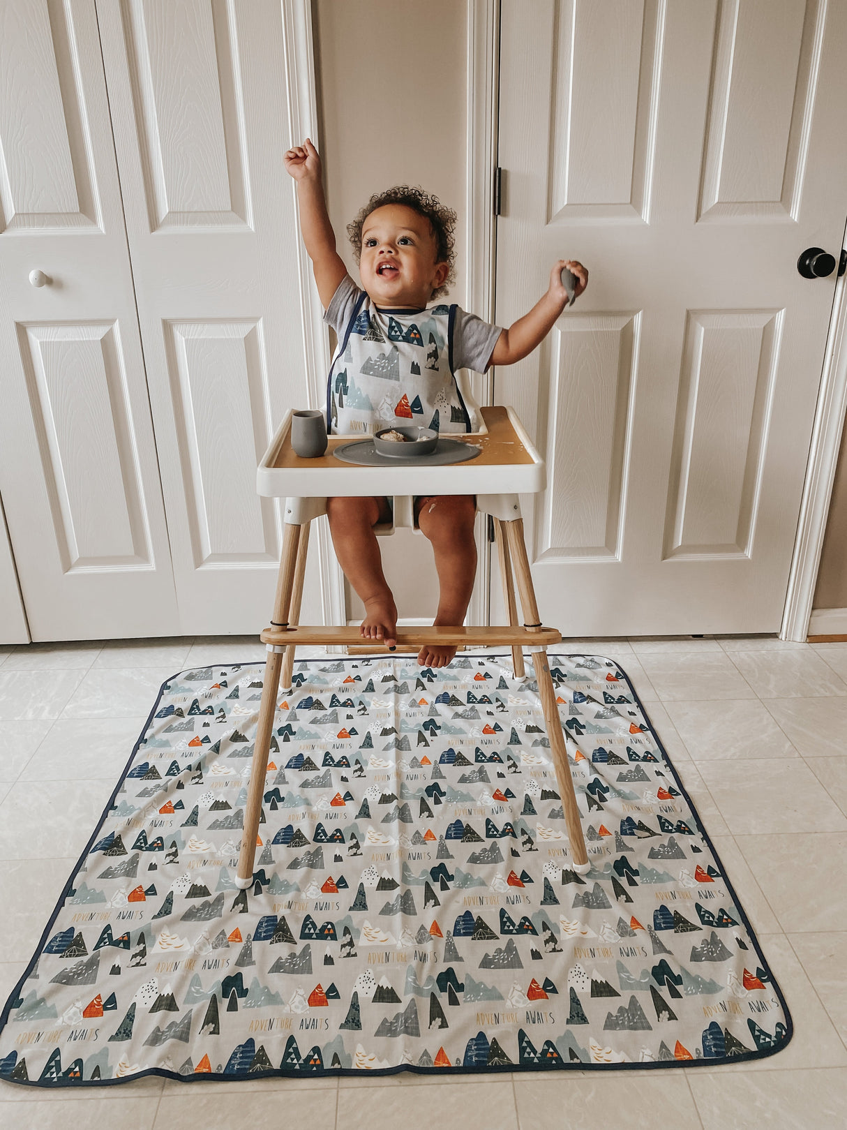 Adventure Awaits Splash Mat - A Waterproof Catch-All for Highchair Spills and More! from BapronBaby