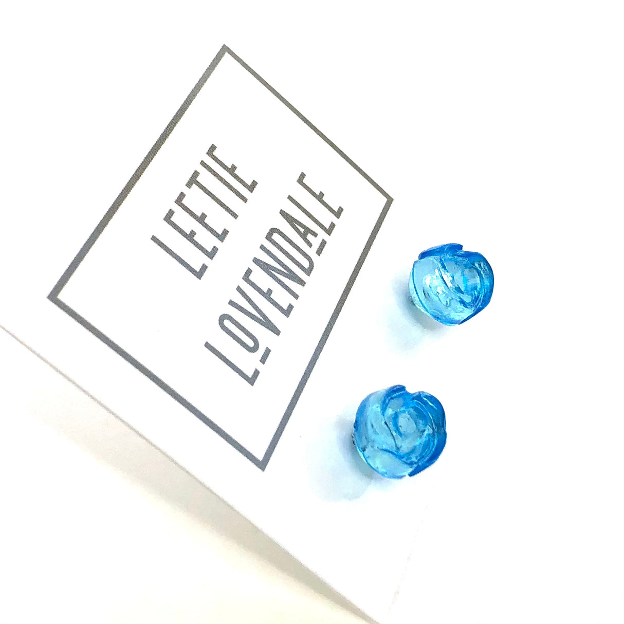 Aqua Blue Carved Lucite Rose Stud Earrings from Leetie Lovendale