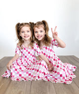 DREAMY PINK CHECKERS DREAM RUFFLE DRESS from DREAM BIG LITTLE CO