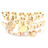 10pcs Pearl Multi Bead Puka Shell Coin Disc Tassel Charm Stretch Layered Stackable Bracelets from Madeline Love