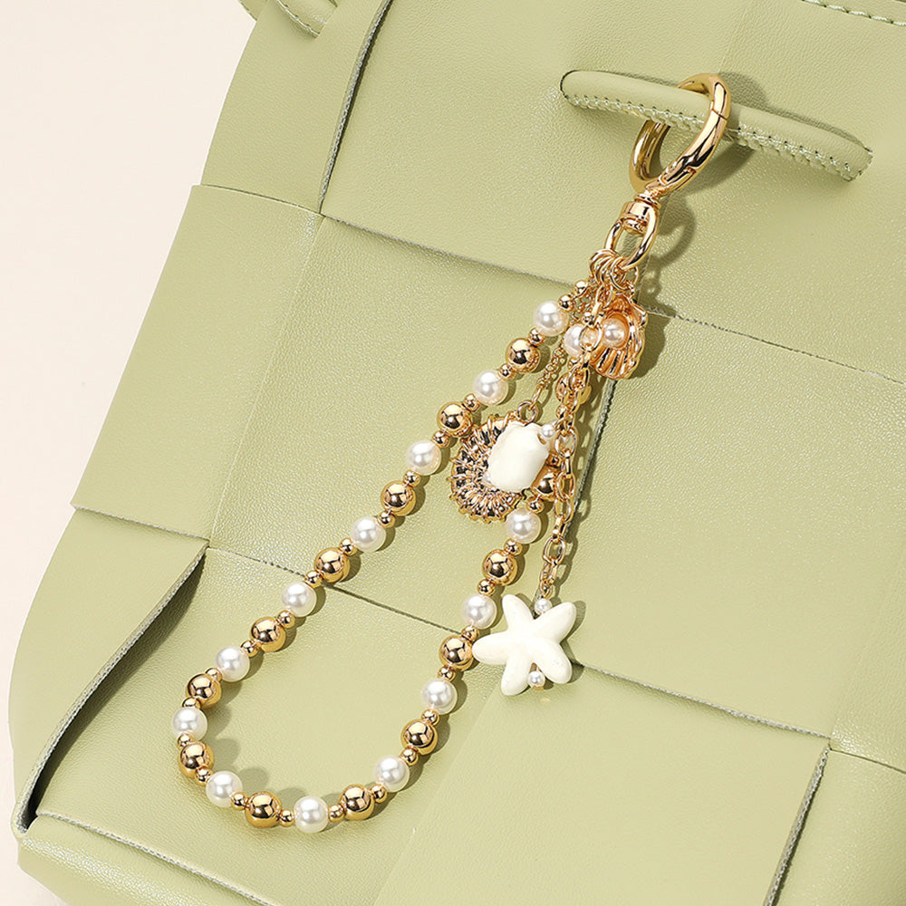 Ceramic Starfish Seashell Metal Pearl Sea Shell Charm Embellished Floral Ceramic Metal Ball Beaded Wristlet Keychain / Bag Charm from Madeline Love