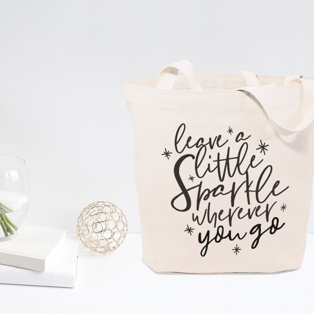 Leave a Little Sparkle Wherever You Go Cotton Canvas Tote Bag from The Cotton & Canvas Co.