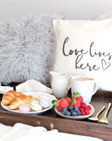 Love Lives Here Pillow Cover from The Cotton & Canvas Co.