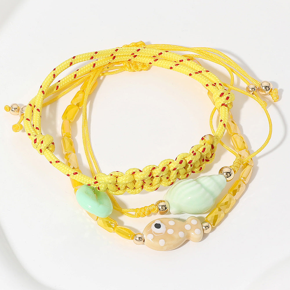3PCS - Ceramic Fish Puka Shell Miter Shell Charm Beaded Braided Cinch Pull Tie Bracelets from Madeline Love