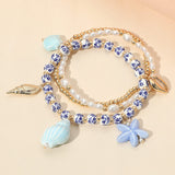 3PCS - Ceramic Starfish Sea Shell Charm Pearl Beaded Stretch Multi Layered Bracelets from Madeline Love
