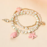 3PCS - Ceramic Starfish Sea Shell Charm Pearl Beaded Stretch Multi Layered Bracelets from Madeline Love