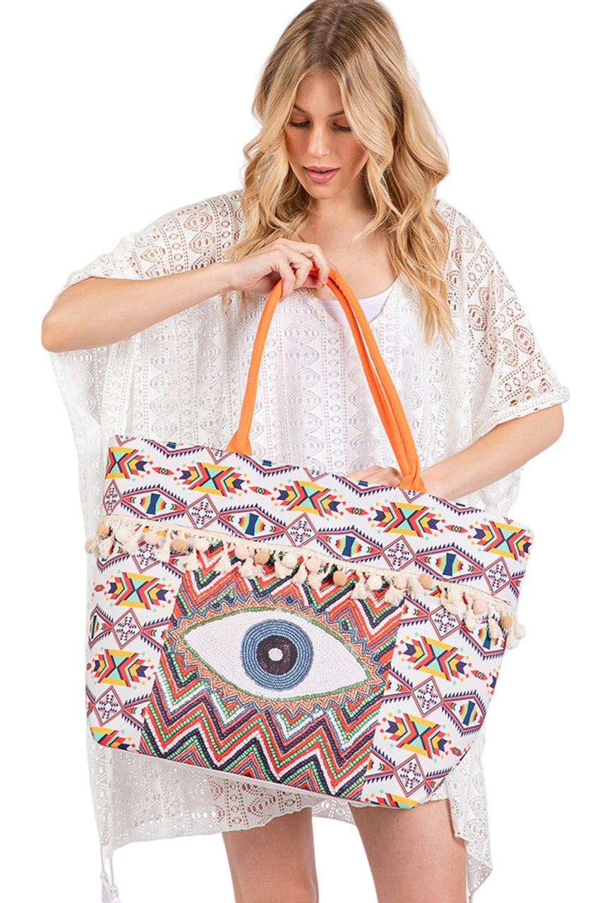 Evil Eye Bead Print Pom Pom Tassel Aztec Tote Bag from Madeline Love